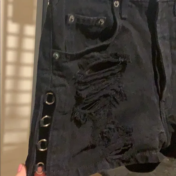 Black carmar shorts ripped