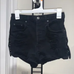 Black carmar shorts ripped