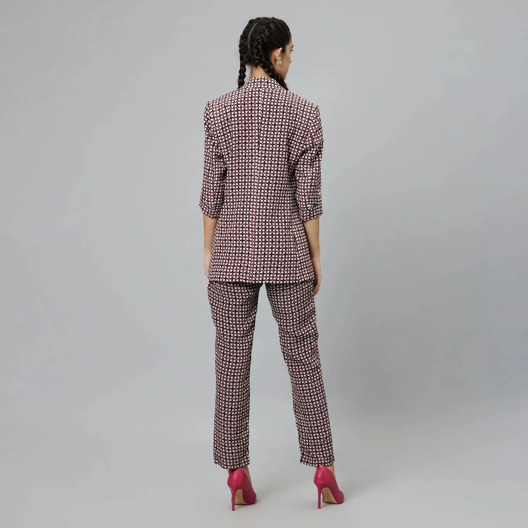 BLACK GEOMETRIC PRINT PANT SUIT PAIRED WITH A BUSTIER