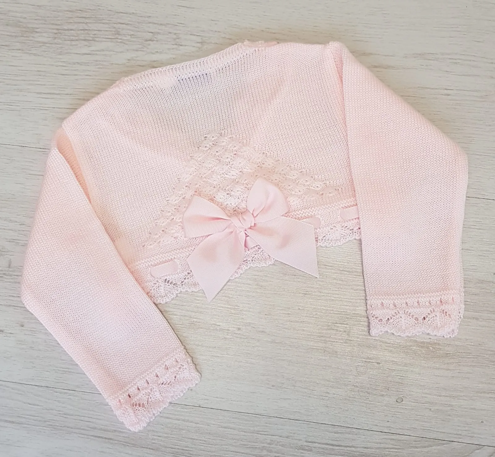 Spanish baby pink ribbon bolero